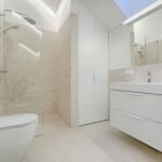 Home Bright and luxurious bathroom with contemporary fixtures and sleek design.